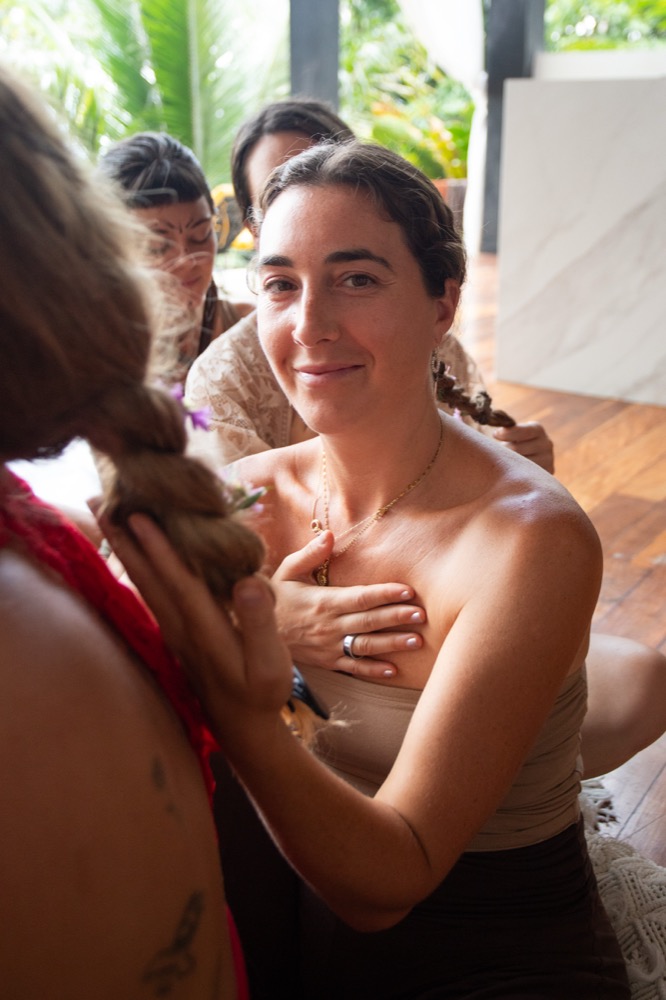 Women sharing a tender moment, hand on heart